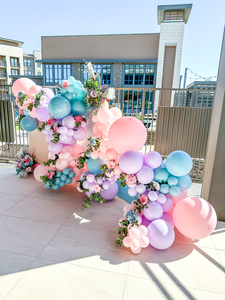 Spring Balloon Garland installed on Arch Panel Rentals for Corporate Grand Opening Event. 